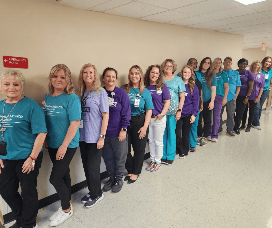 Highpoint Health - Trousdale wearing teal and purple for Suicide Prevention